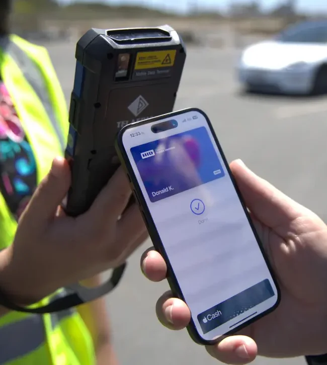 HID mobile credentials being read with an xpid handheld reader