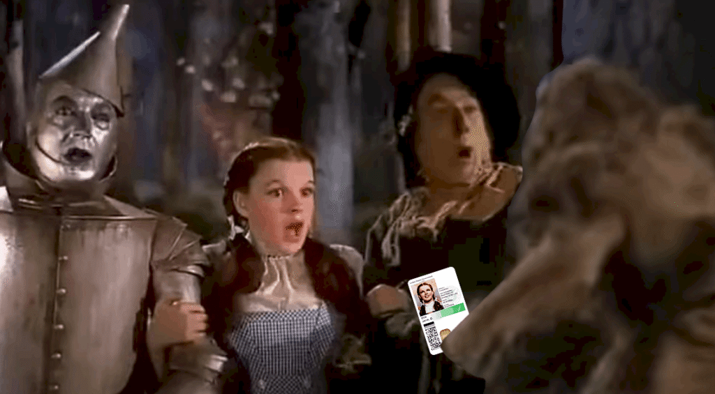 Wizard of Oz characters looking at a PIV badge with QR code and photo ID