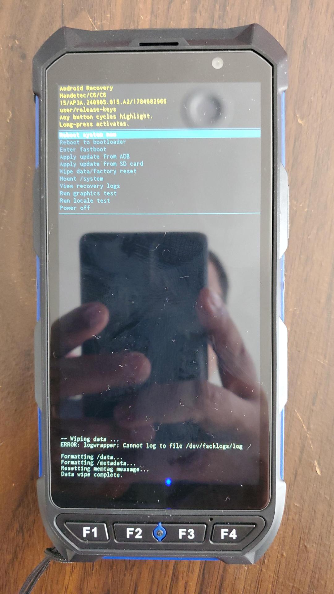 XPID210 Android Recovery menu showing 'Data wipe complete' with Reboot system now highlighted